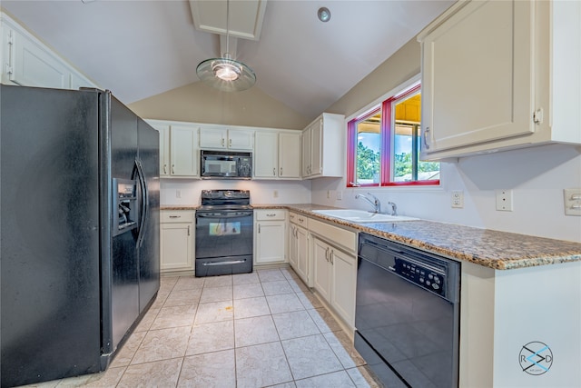 kitchen featuring black appliances, vaulted ceiling, sink, and light tile patterned flooring