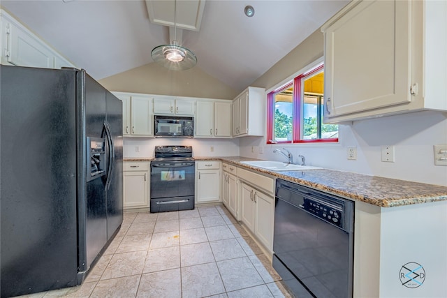 172 Colonial Dr, Mabank, TX 75156 - kitchen featuring light tile patterned floors, white cabinets, black appliances, lofted ceiling, and a sink