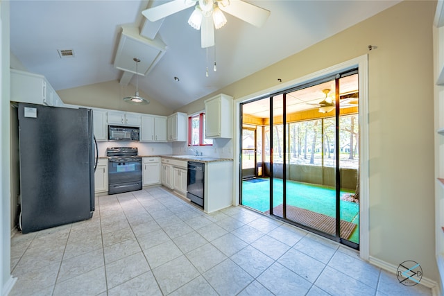 kitchen with black appliances, ceiling fan, white cabinetry, and lofted ceiling with beams