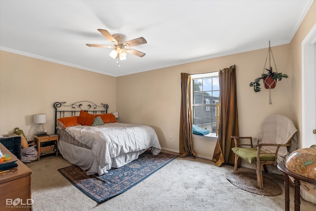 carpeted bedroom featuring ornamental molding and ceiling fan