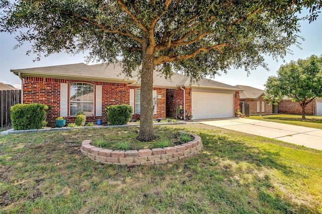 ranch-style home with a garage and a front yard