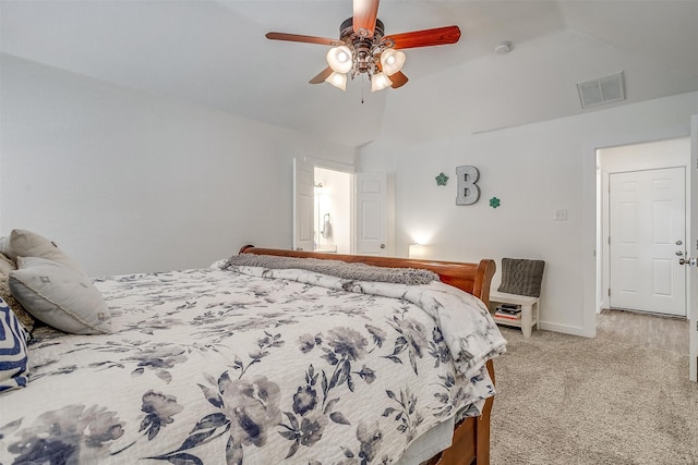 bedroom with light carpet, lofted ceiling, and ceiling fan