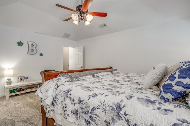 bedroom featuring ceiling fan, carpet, and vaulted ceiling