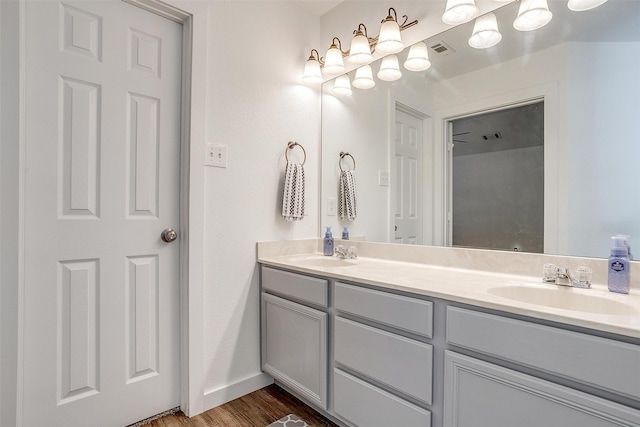 bathroom featuring vanity and wood-type flooring