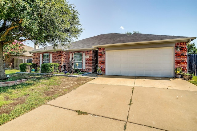 ranch-style house featuring a garage