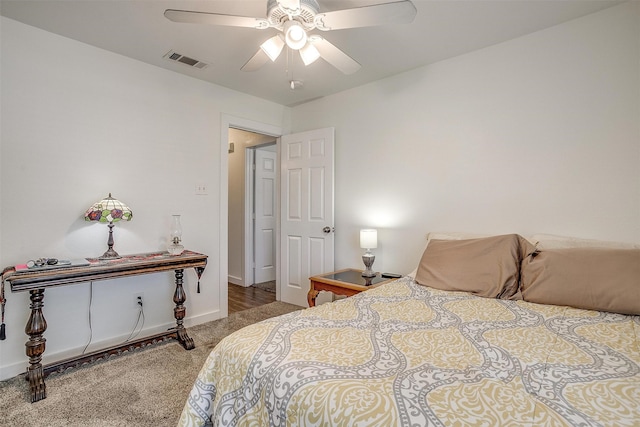 bedroom featuring hardwood / wood-style flooring and ceiling fan