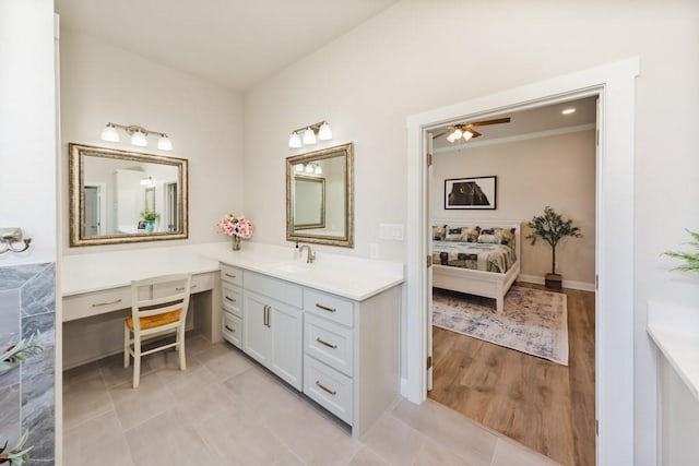 full bath featuring vanity, tile patterned flooring, ensuite bathroom, and ceiling fan