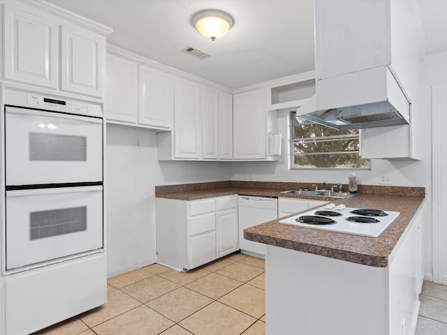 kitchen featuring white cabinetry, light tile patterned floors, white appliances, and sink