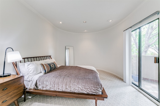 carpeted bedroom featuring access to outside and ornamental molding