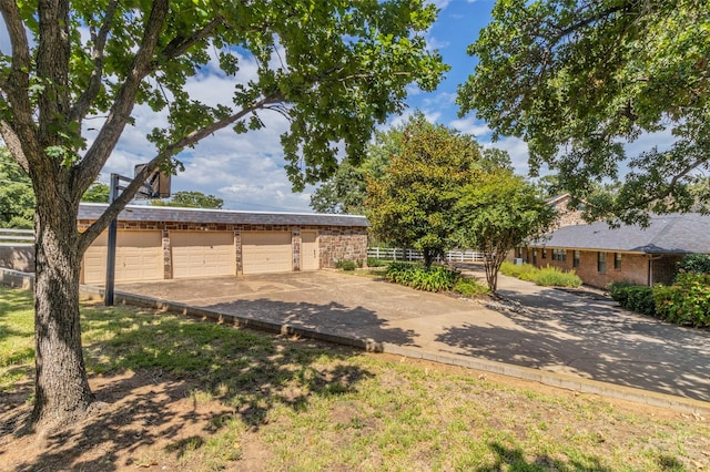 view of yard featuring a garage