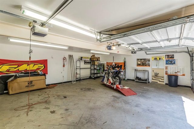 garage featuring a garage door opener