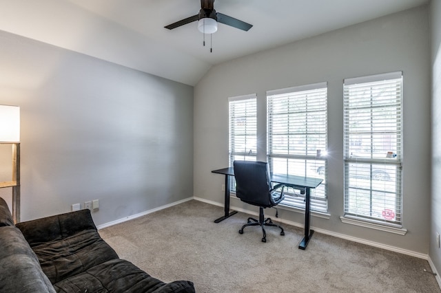 office area featuring vaulted ceiling, ceiling fan, carpet, and a healthy amount of sunlight