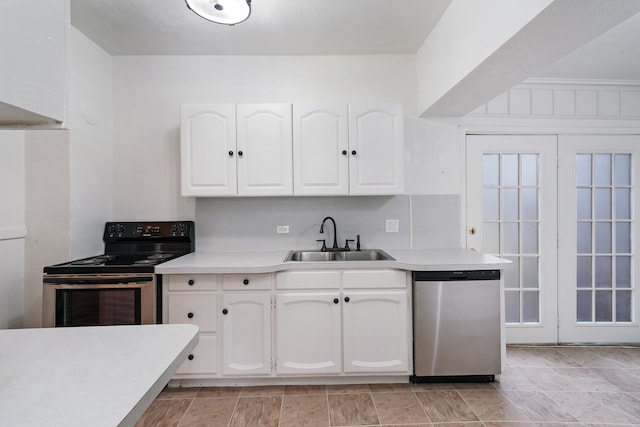 kitchen featuring black / electric stove, sink, white cabinetry, and stainless steel dishwasher