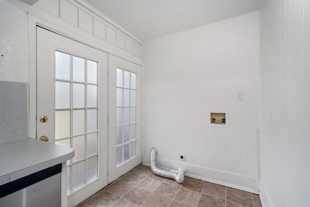 washroom featuring hookup for a washing machine, crown molding, and electric dryer hookup