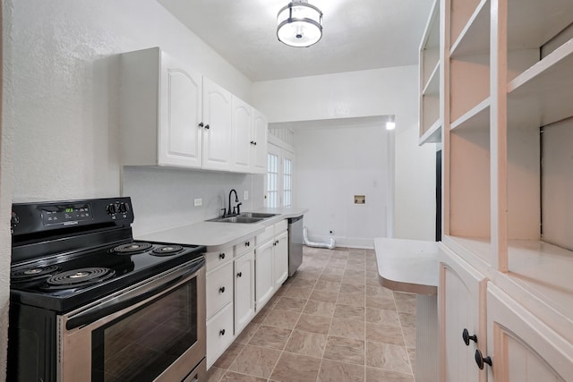 kitchen featuring black electric range, white cabinets, dishwasher, and sink