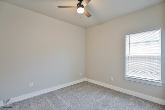 unfurnished room with ceiling fan and carpet floors