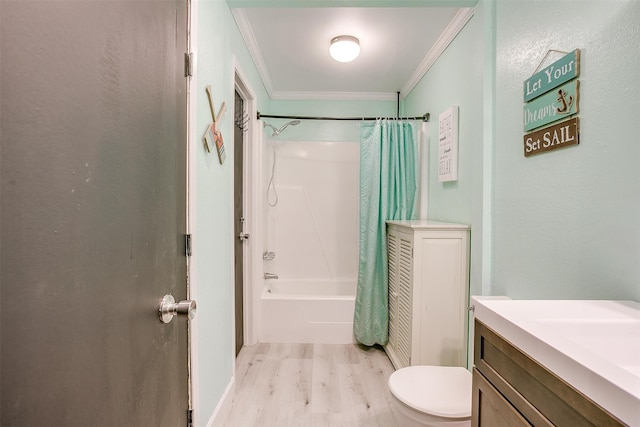 full bathroom with vanity, toilet, shower / bath combo with shower curtain, ornamental molding, and wood-type flooring