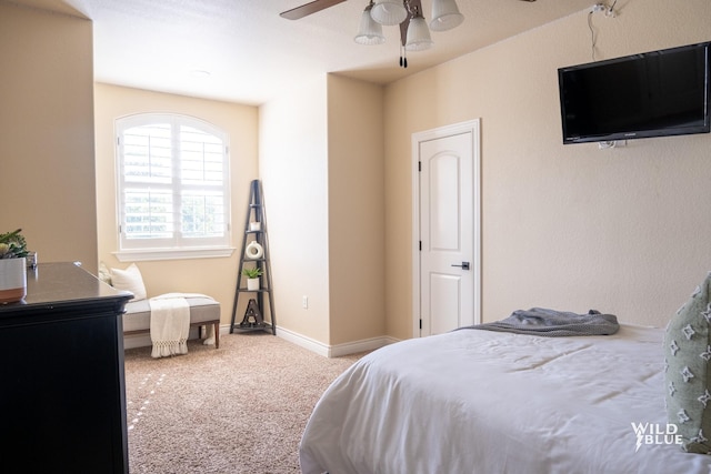 bedroom with ceiling fan and carpet