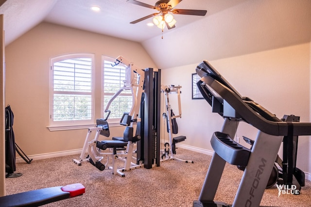 workout area featuring light carpet, vaulted ceiling, and ceiling fan