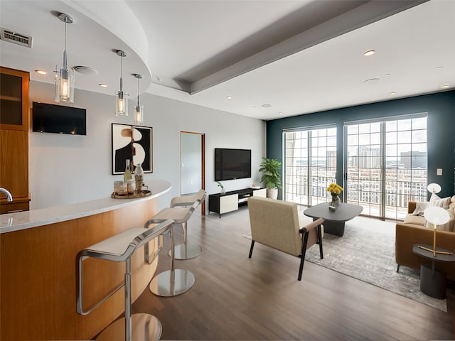 living room featuring dark hardwood / wood-style flooring