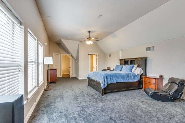 carpeted bedroom featuring multiple windows, lofted ceiling, and ceiling fan