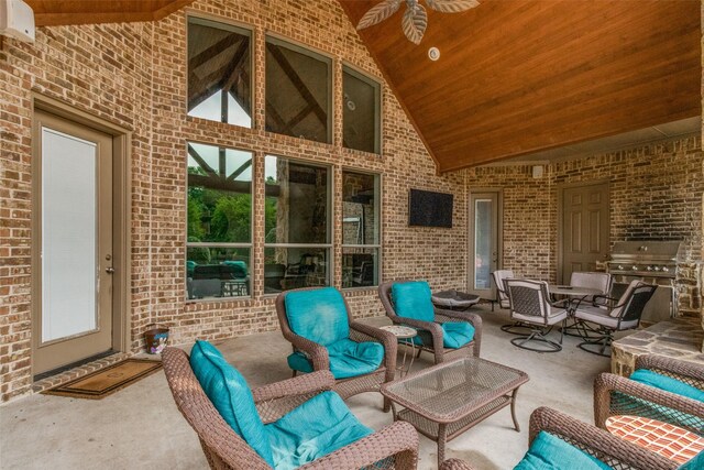 view of patio with an outdoor living space and ceiling fan