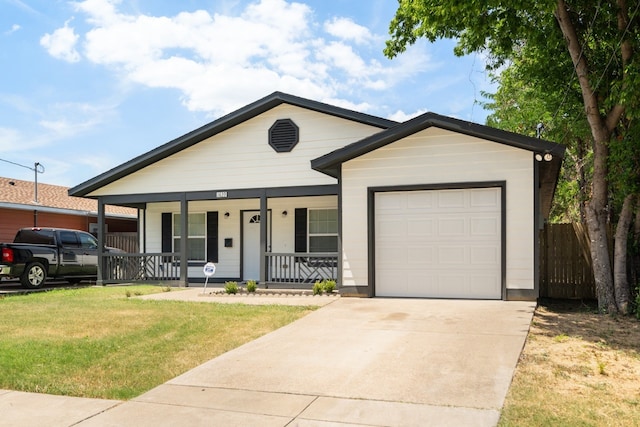 ranch-style home with a front lawn, a garage, and a porch