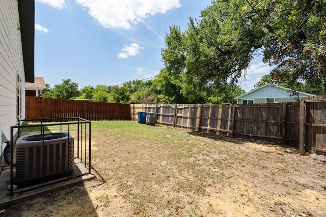 view of yard with central air condition unit