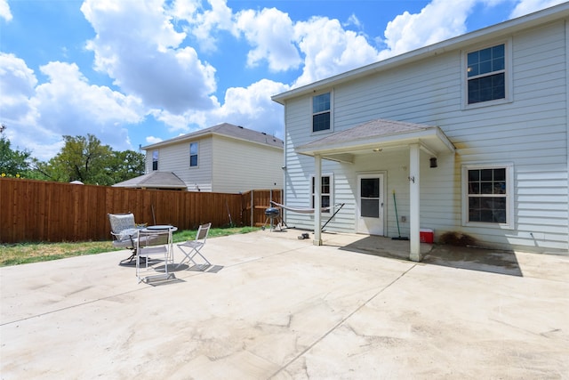 back of house featuring a patio