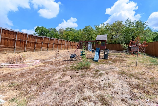 view of yard featuring a playground