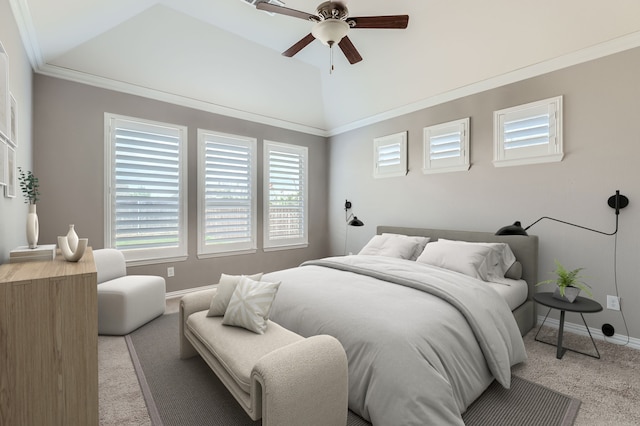 carpeted bedroom with ceiling fan and crown molding