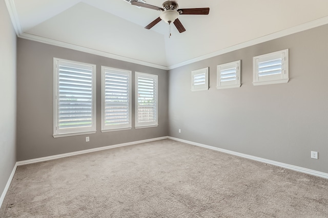 empty room featuring a healthy amount of sunlight, carpet flooring, ornamental molding, and ceiling fan