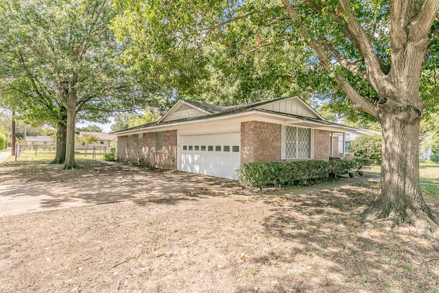 view of home's exterior with a garage