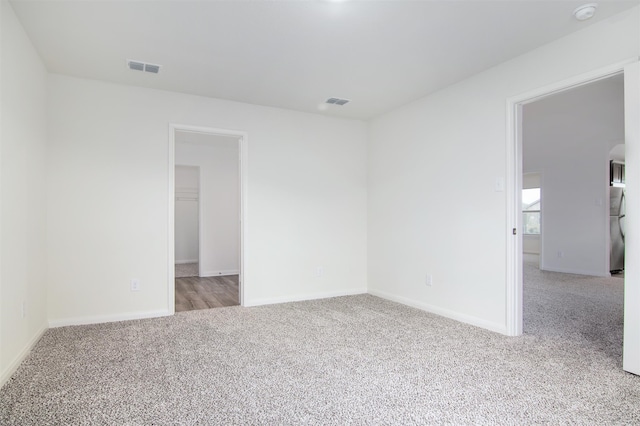 spare room with carpet flooring