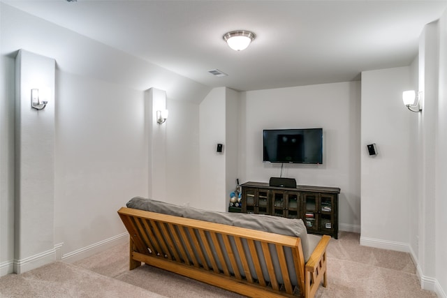 bedroom with light colored carpet