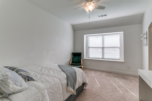 carpeted bedroom featuring ceiling fan and lofted ceiling