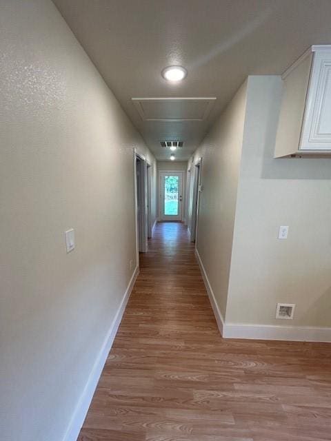 hallway featuring light hardwood / wood-style floors