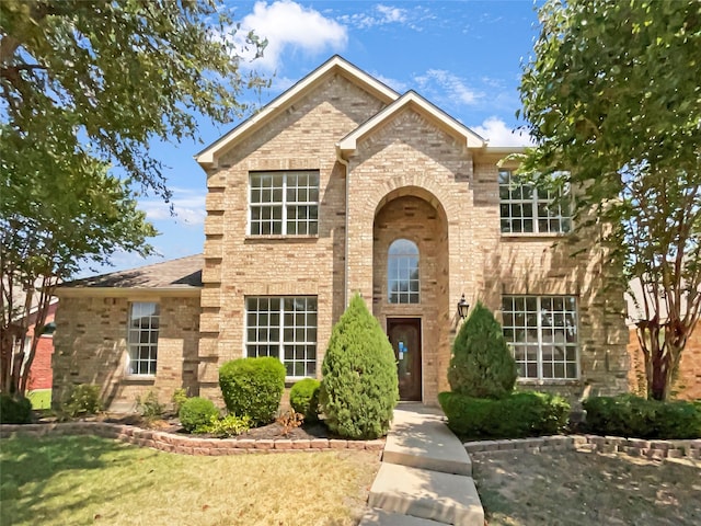 view of front of house with a front lawn