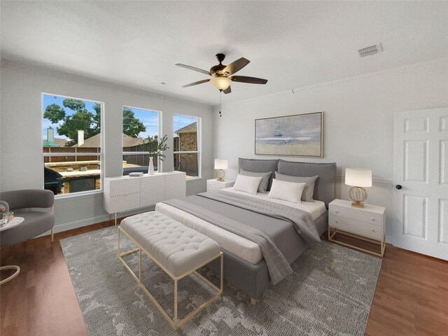 bedroom featuring dark wood-type flooring and ceiling fan