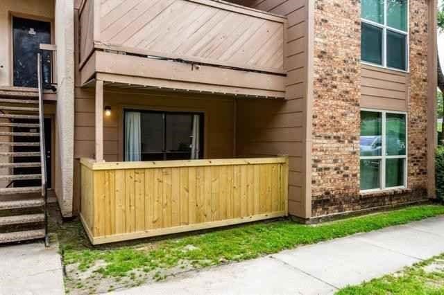 view of property exterior featuring stairs