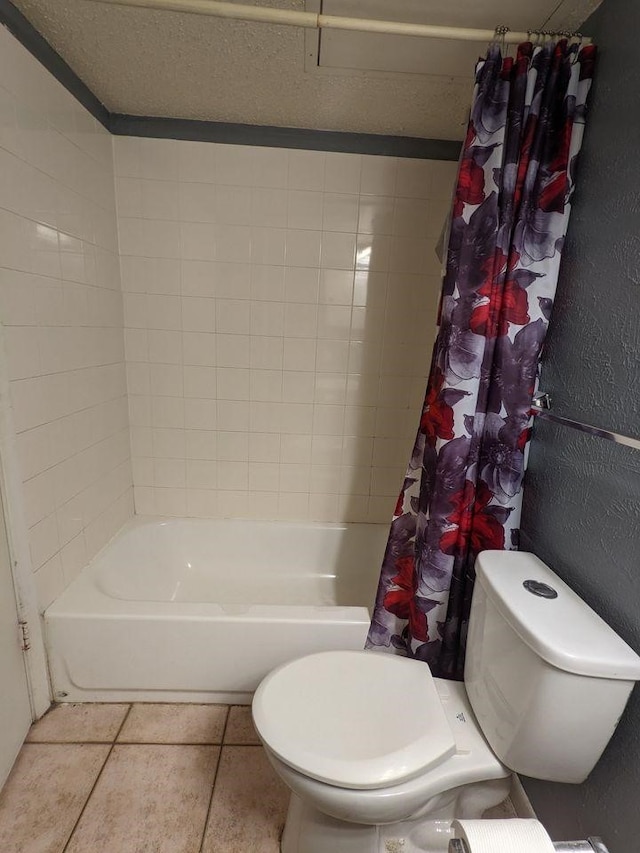 bathroom featuring a textured wall, shower / tub combo, toilet, and tile patterned floors