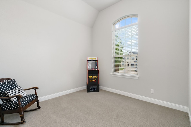 1205 Lake Hills Trl, Roanoke, TX 76262 - living area featuring lofted ceiling, carpet floors, and baseboards