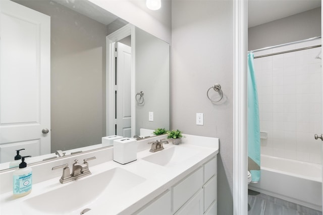 1205 Lake Hills Trl, Roanoke, TX 76262 - bathroom featuring a sink, double vanity, toilet, and shower / bathtub combination with curtain