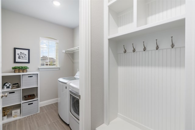 laundry area with washing machine and dryer