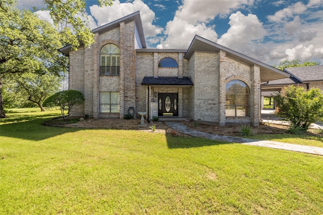 view of front of home featuring a front lawn