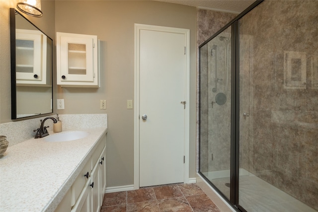 bathroom with vanity and walk in shower