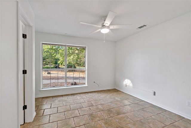 unfurnished room featuring ceiling fan