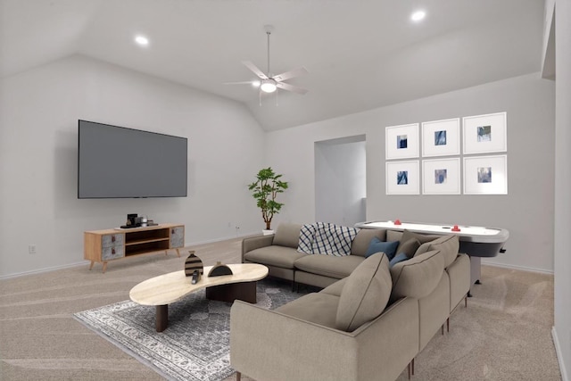 carpeted living room featuring lofted ceiling and ceiling fan