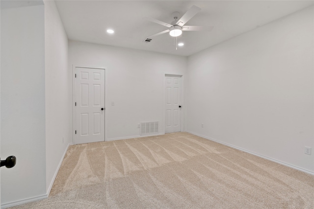 carpeted empty room with ceiling fan