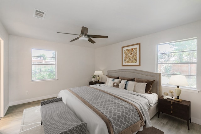 bedroom featuring ceiling fan and light wood-type flooring